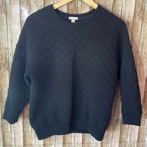 Black quilted gently used xs sweater.